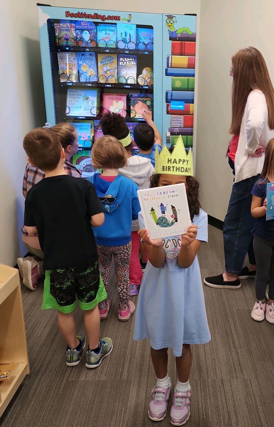 Ms. Jackson coordinated the purchased of the praised book machine.